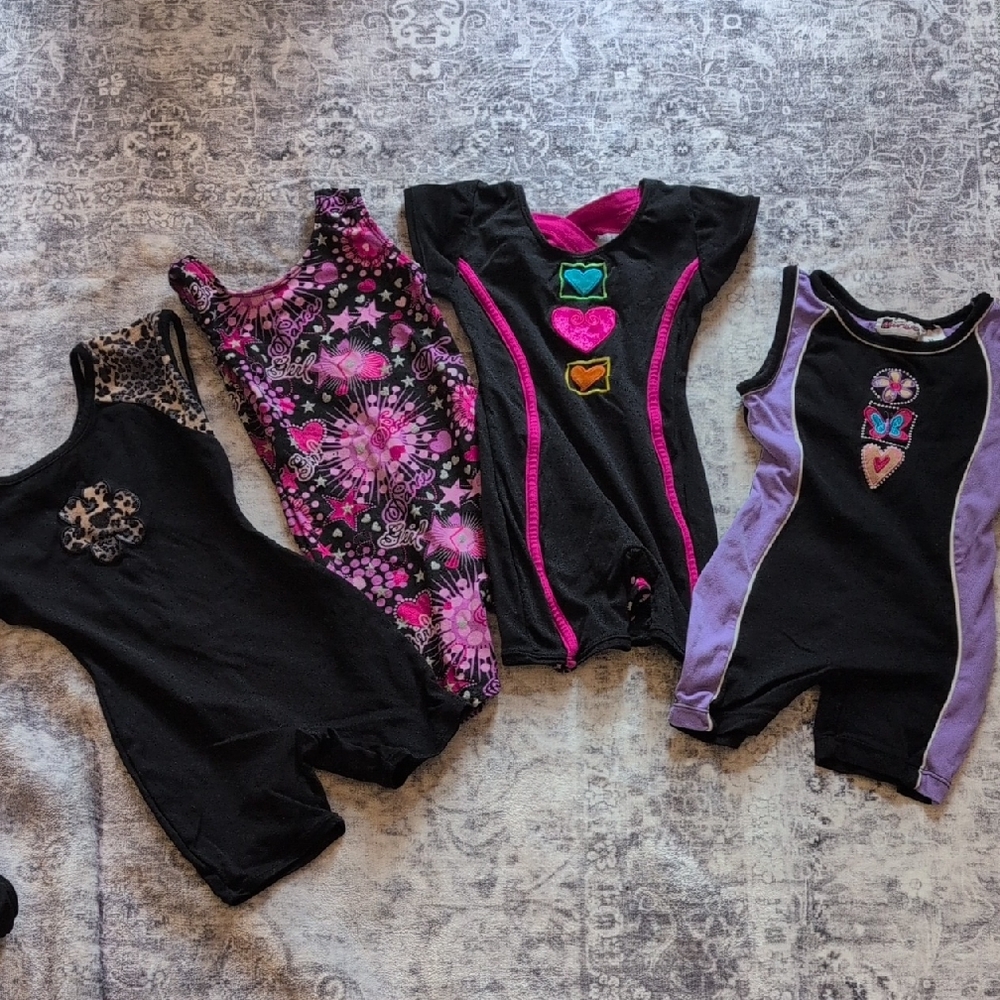 Jacques Moret Black and Purple Kids Bodysuit Collection